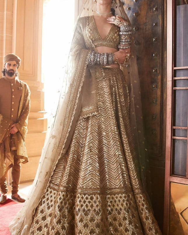 Antique Gold Bridal Lehenga with Heavy Embroidery & Net Dupatta - Rosepetals Luxe