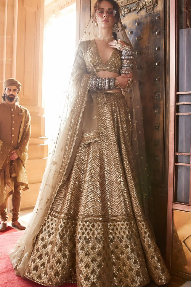 Antique Gold Bridal Lehenga with Heavy Embroidery & Net Dupatta - Rosepetals Luxe