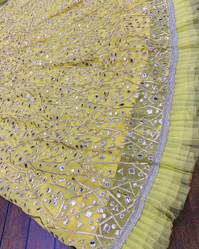 Yellow Georgette Lehenga Choli with Zari & Foil Work | Net Ruffle Border | Semi - Stitched - Rosepetals Luxe