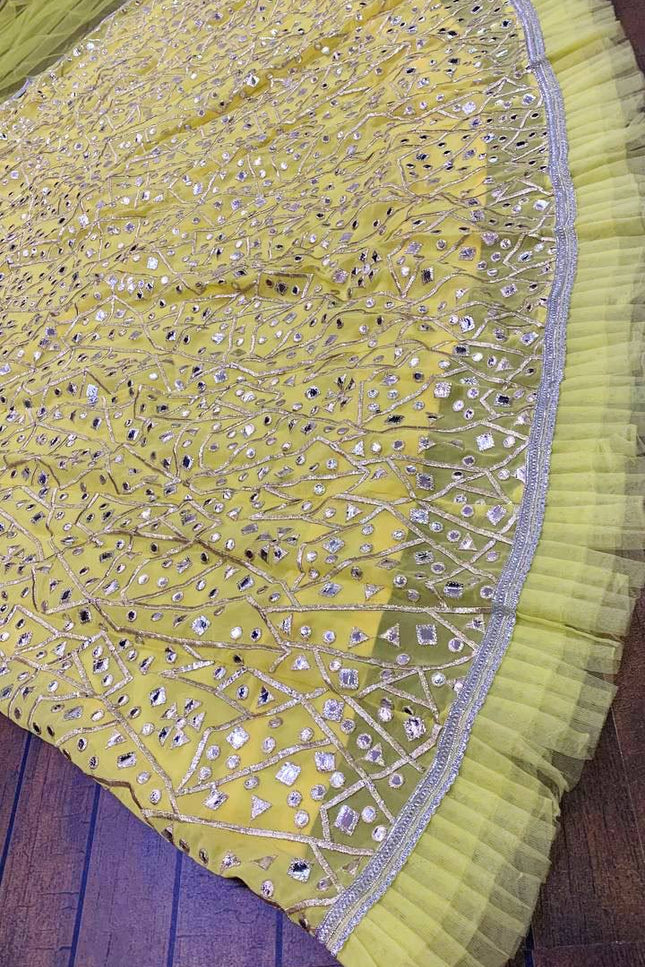 Yellow Georgette Lehenga Choli with Zari & Foil Work | Net Ruffle Border | Semi - Stitched - Rosepetals Luxe